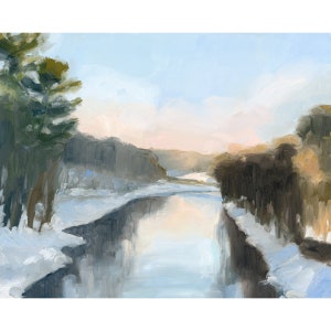 May include: A painting depicting a river winding through a snowy landscape. The river is tranquil, reflecting the pale blue sky with touches of pink. Trees line the riverbanks, and the snow is white and fluffy.