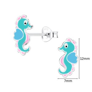 May include: Sterling silver stud earrings featuring a blue and pink seahorse design. The earrings are 12mm tall and 7mm wide.