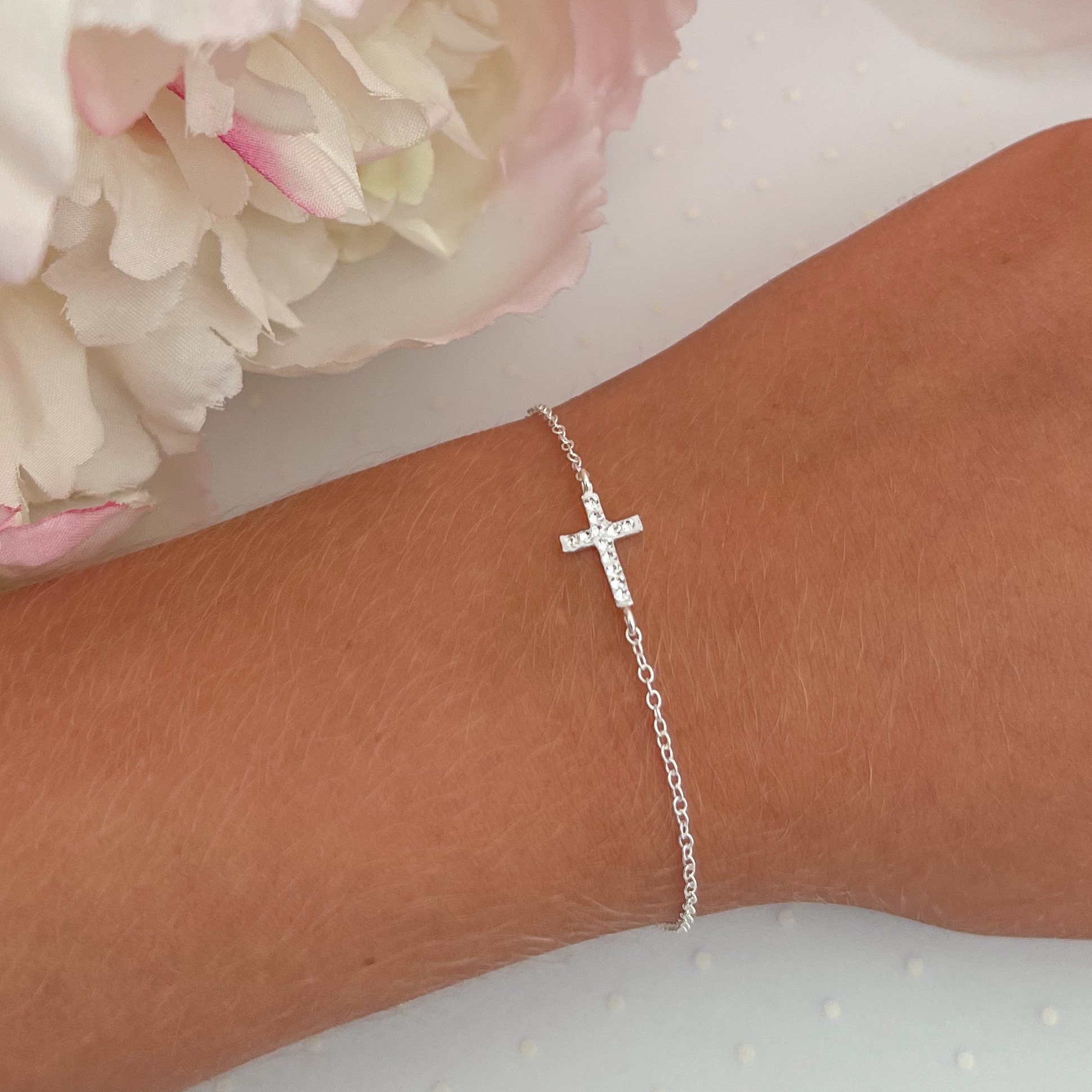 Silver sideways cross bracelet deals