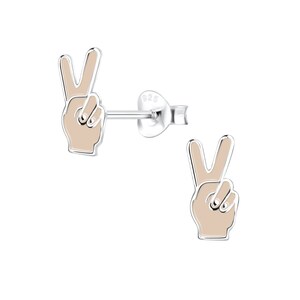 May include: A pair of silver peace sign earrings with a beige enamel fill. The earrings are in the shape of a hand making the peace sign.