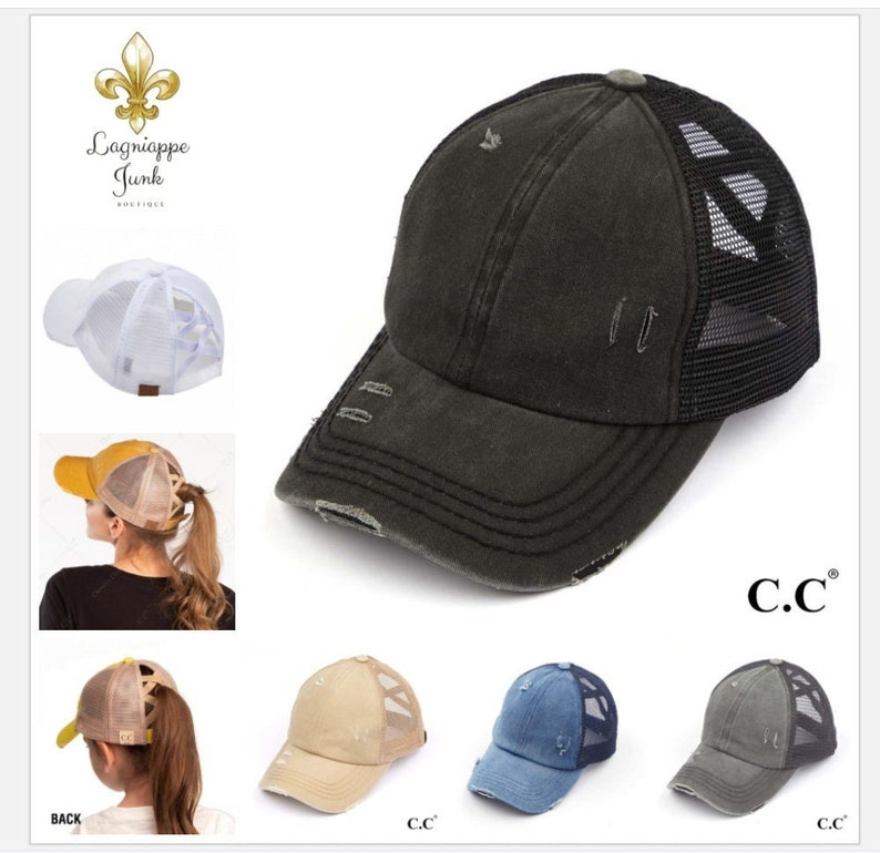 May include: A collection of distressed baseball caps with mesh backs. The main cap is dark gray with a black mesh back and distressed details. Additional caps in white, tan, blue, and gray are also shown. The brand logo "C.C." is visible.