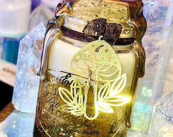 magic candle ritual grounding candle spell recentering energy earth green magic woody amber scent