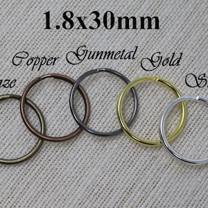 May include: Five jump rings in different finishes: bronze, copper, gunmetal, gold, and silver. Each ring is 1.8 x 30 mm.