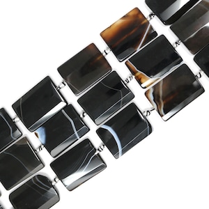 36 x 26 mm rektangulär glaspärlsträng (9 pärlor i strängen)