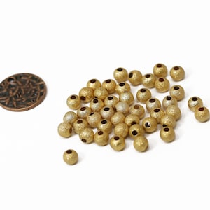 6mm Gold Plated Round Brushed Spacer Beads (50 Pieces)