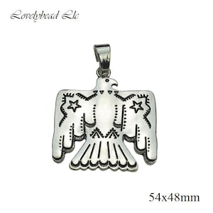 May include: Silver pendant featuring a stylised eagle design with intricate details. The eagle has two stars on its wings and measures 54x48mm.