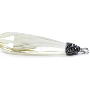 May include: A teardrop-shaped crystal pendant with a silver tone setting. The setting is covered in small black crystals.