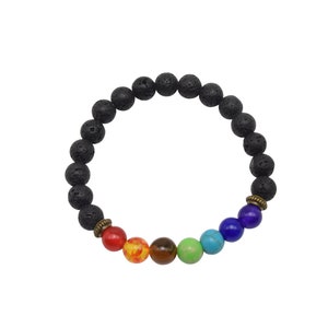 May include: A black lava stone bracelet with seven chakra beads. The beads are red, orange, yellow, green, turquoise, blue, and purple.