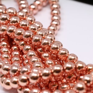 Rose Gold Hematite Gemstone Beads. Round Smooth 4mm,6mm,8mm,10mm Loose Beads. 15.5 inch Full Strand
