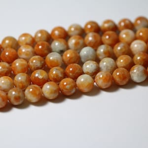 Polished Round A+ Peach Calcite Gemstone Beads (15.5 Inches Long Strand)