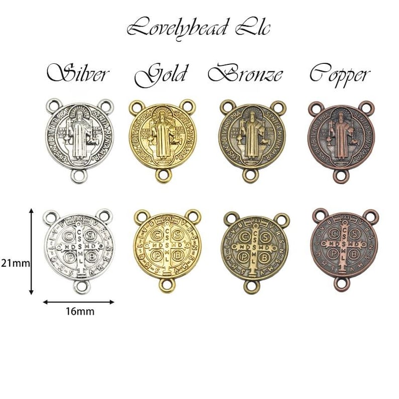 May include: A set of eight Saint Benedict medals in four different finishes: silver, gold, bronze, and copper. The medals are 21 mm in diameter and feature a detailed image of Saint Benedict with a cross and inscription. The medals are perfect for adding a touch of faith to your jewelry or crafts.