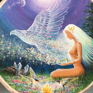 May include: A circular painting on a wooden canvas depicting a woman with long white hair and a white bird with iridescent wings. The woman is sitting on a bed of flowers and holding a small bird in her hand. The background is a starry night sky with a full moon.