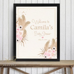May include: A printable sign for a baby shower with a floral design and the text "Welcome to Camila's Baby Shower May 22, 2021".