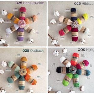 May include: A collection of 10 different colored yarn skeins arranged in a starburst pattern. Each skein has a number and a color name printed on a label. The yarn is labeled with the brand name "Caterpillar".