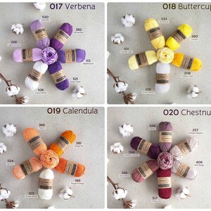 May include: A collection of 10 different colored yarn skeins arranged in a circle. Each skein has a label with a number and a color name. The colors include light orchid, apricot, snow white, bridal white, peach, candle light, tangerine, shadow purple, royal orange, rose wine, ashes, ruby, lavender, ultra violet, deep violet, delphinium, primrose, lemon, yellow gold, antique mauve, and soft beige.