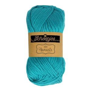 May include: A skein of teal blue yarn with a brown label that reads "Scheepjes Namaste".