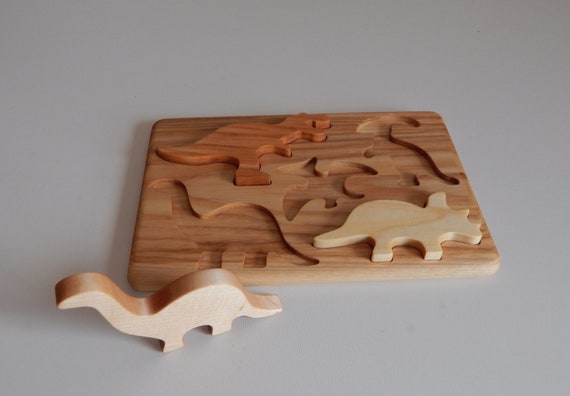 Puzzle à boutons en bois Dinosaures - Enfantillage