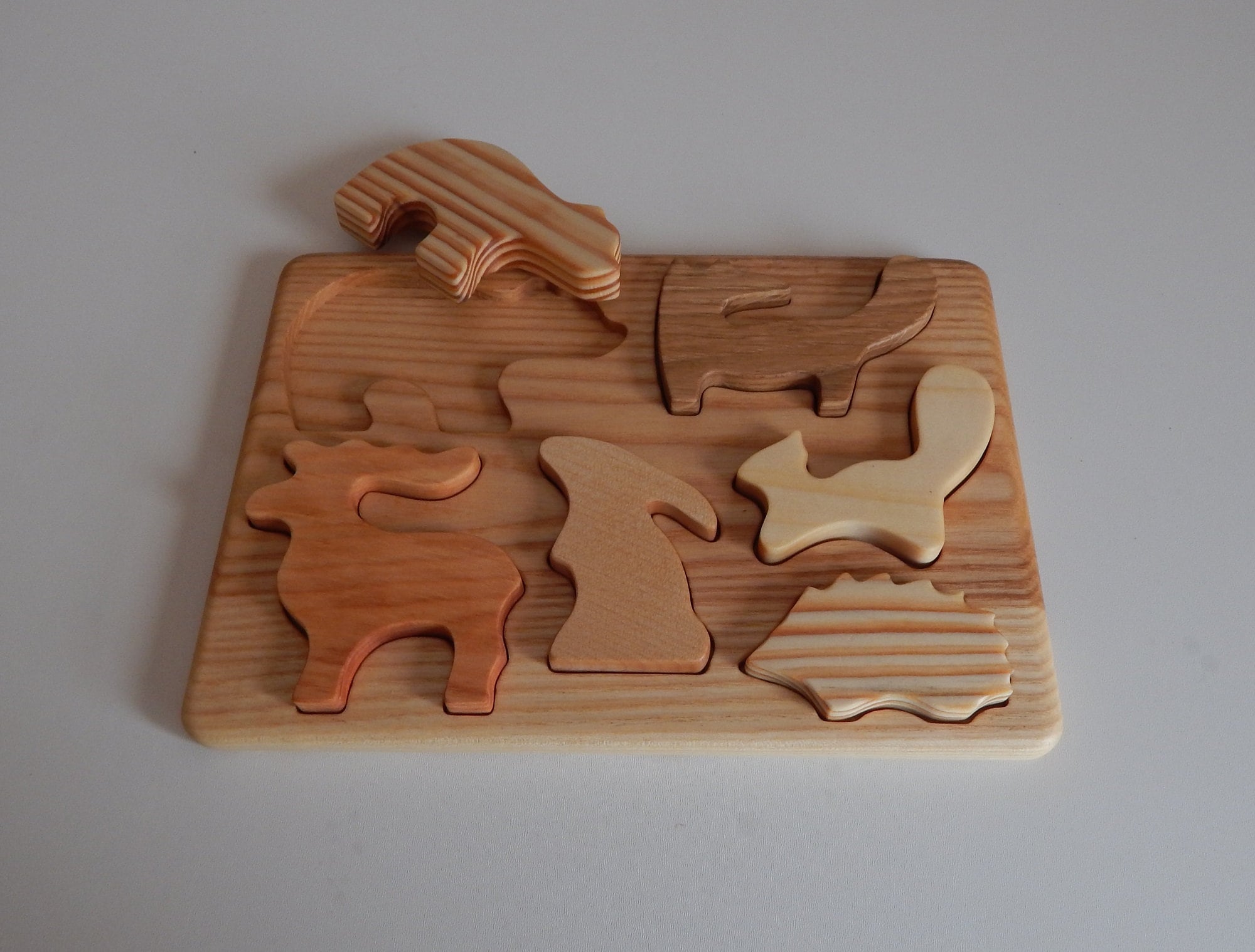 Animal puzzles de madera clearance