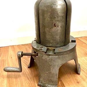 Antique metal milners shop display hat stretcher vintage retro decor haberdashery apothecary mancave warmer aluminium