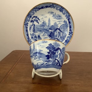 An antique Wedgwood porcelain cup and saucer