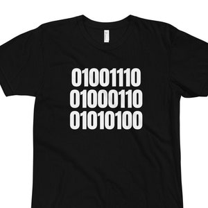 May include: Black t-shirt with white text that reads "01001110 010000110 01010100"
