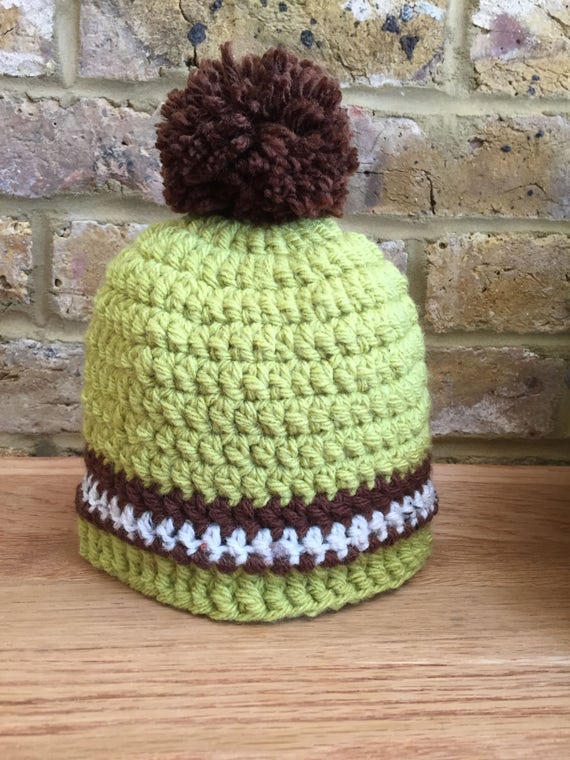 brown bobble hat