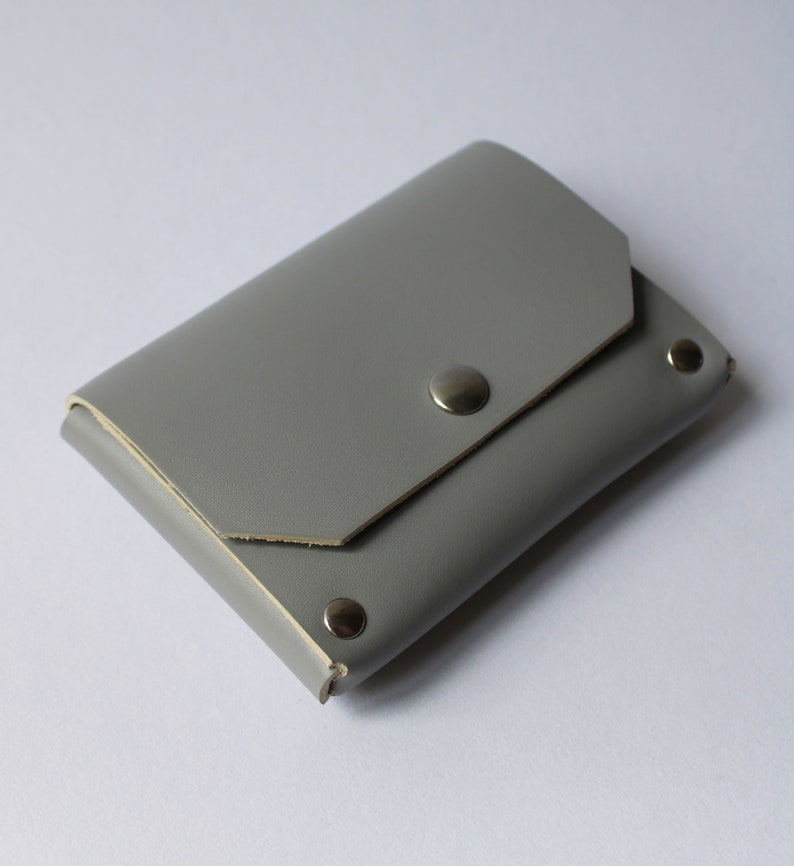 Door LUTI currency Grey leather
