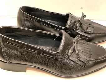 Vintage 80s fringed loafers in black leather