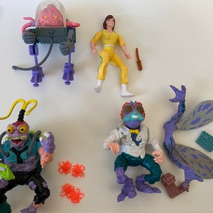 Teenage Mutant Ninja Turtle Krang And April Baxter Stockman And Scumbug Fly