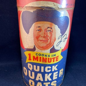Caixa de papelão redonda de aveia Quaker vintage de 1 libra.