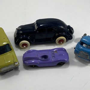 Diecast Vehicles Tootsie Toys Metosul etc Lot Of 4