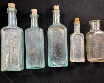 5 Antique Bottles Quackery Medicine Bottles Etc.