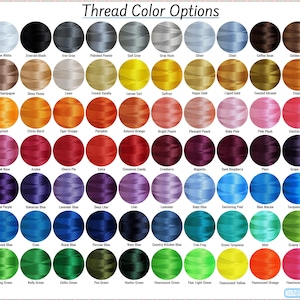 May include: A color chart displaying a wide array of thread color options. The image features a grid of thread spools in various shades, including white, black, gray, blue, green, yellow, orange, pink, and brown. The text "Thread Color Options" is at the top.