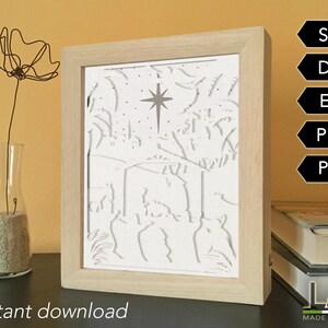 Layered Christmas nativity shadow box cut files instant download. Files included are SVG, PNG, PDF, DXF, EPS. This 3D Christmas shadow box can be made with white or colored paper cut cardstock inside a shadow box frame.