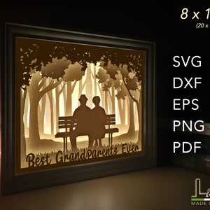 3D light box design with grandparents sitting on a bench. This grandparents shadow box template includes SVG, PNG, PDF, DXF and EPS files for cutting machines and laser cut. Size 8x10 inches.