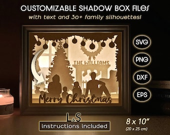 May include: A customizable shadow box file for a Christmas scene with a family silhouette, a Christmas tree, and the text "THE WILLIAMS" and "Merry Christmas". The file is available in SVG, PNG, DXF, and EPS formats. Instructions are included. The shadow box is 8 inches by 10 inches (20 cm by 25 cm).