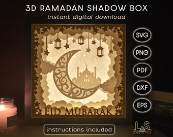 May include: A digital download of a 3D Ramadan shadow box design featuring a crescent moon, mosque, and stars. The design includes the text "EID MUBARAK". The file formats included are SVG, PNG, PDF, DXF, and EPS.