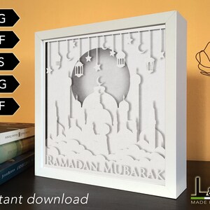 3D light box design for Ramadan with boy praying. This Islamic shadow box template includes SVG, PNG, PDF, DXF and EPS files for cutting machines and laser cut. Size 8x8 inches.