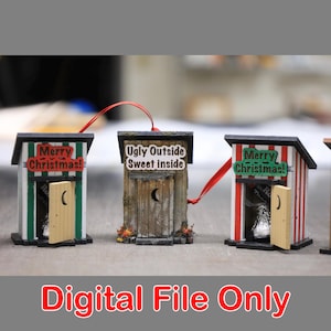 May include: Miniature outhouse Christmas ornaments with red ribbon hangers. One ornament has the text "Merry Christmas!" and another reads "Ugly Outside Sweet Inside." The third ornament also says "Merry Christmas!" The words "Digital File Only" are at the bottom.