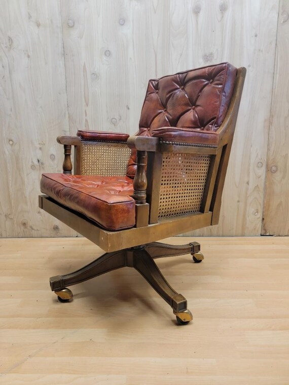 Tufted leather swivel armchair deals