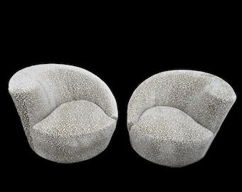 MCM Vladimir Kagan Nautilus asymmetrische draaifauteuils, paar