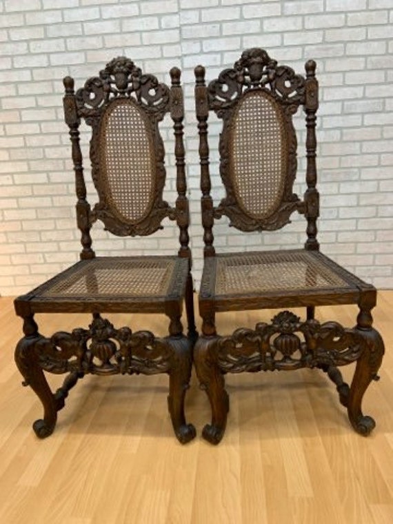 Sold at Auction: A pair of Jacobean style straight back chairs
