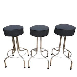 Vintage Industrial Swivel Bar Stools Newly Upholstered in a Charcoal Wool - 3 Piece Set