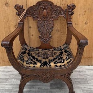 Antique north wind face chair hotsell
