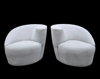 MCM Vladimir Kagan Nautilus asymmetrische draaifauteuils, paar