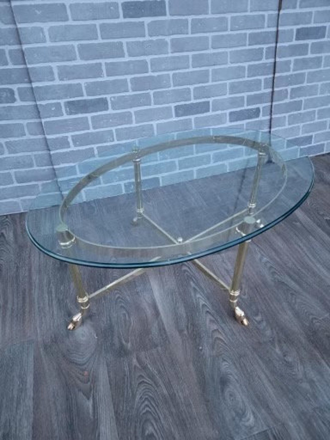 Mid Century Modern Oval Beveled Glass Top Coffee Table on a Brass Base