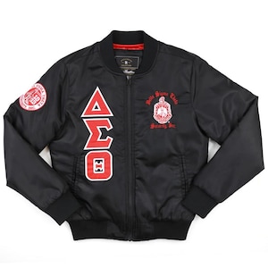 May include: Black bomber jacket with red and white embroidered letters "Delta Sigma Theta" and a crest with the text "Delta Sigma Theta Sorority, Inc."