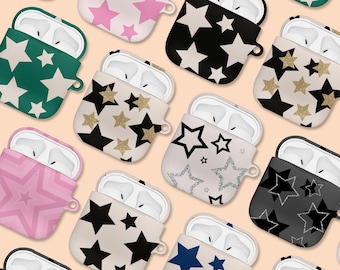 May include: Assortment of Airpod cases with various star patterns. The cases are in pink, black, white, green, and blue with gold accents.