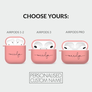 May include: Three pink Airpods cases with a personalized name, "marilyn", printed on the front. The cases are for Airpods 1-2, Airpods 3, and Airpods Pro.