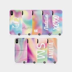 May include: Nine different phone cases with a tie-dye pattern and personalized names or text. The cases are in shades of pink, blue, yellow, and green.
